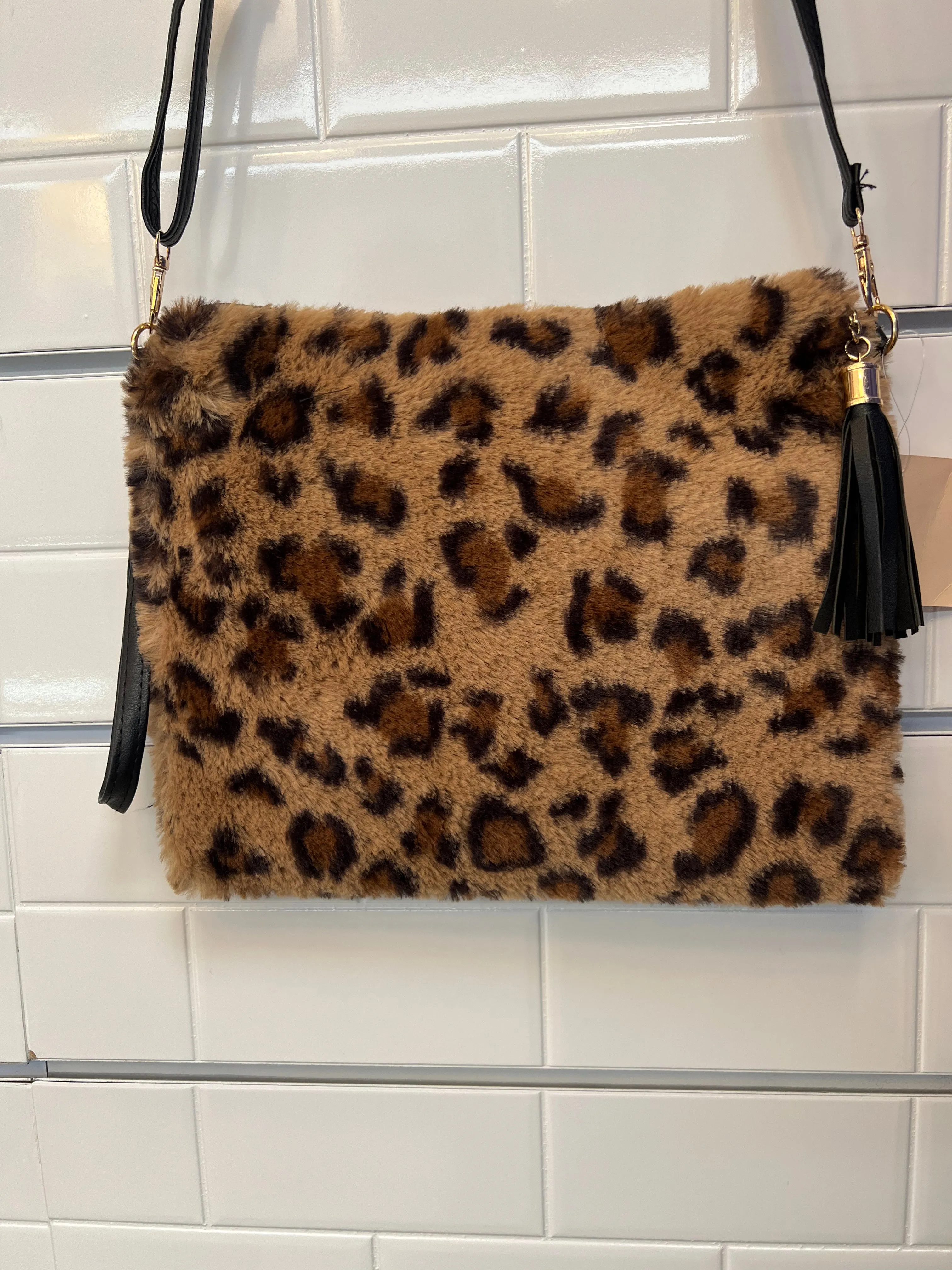 Crossbody handbags with wristlet straps