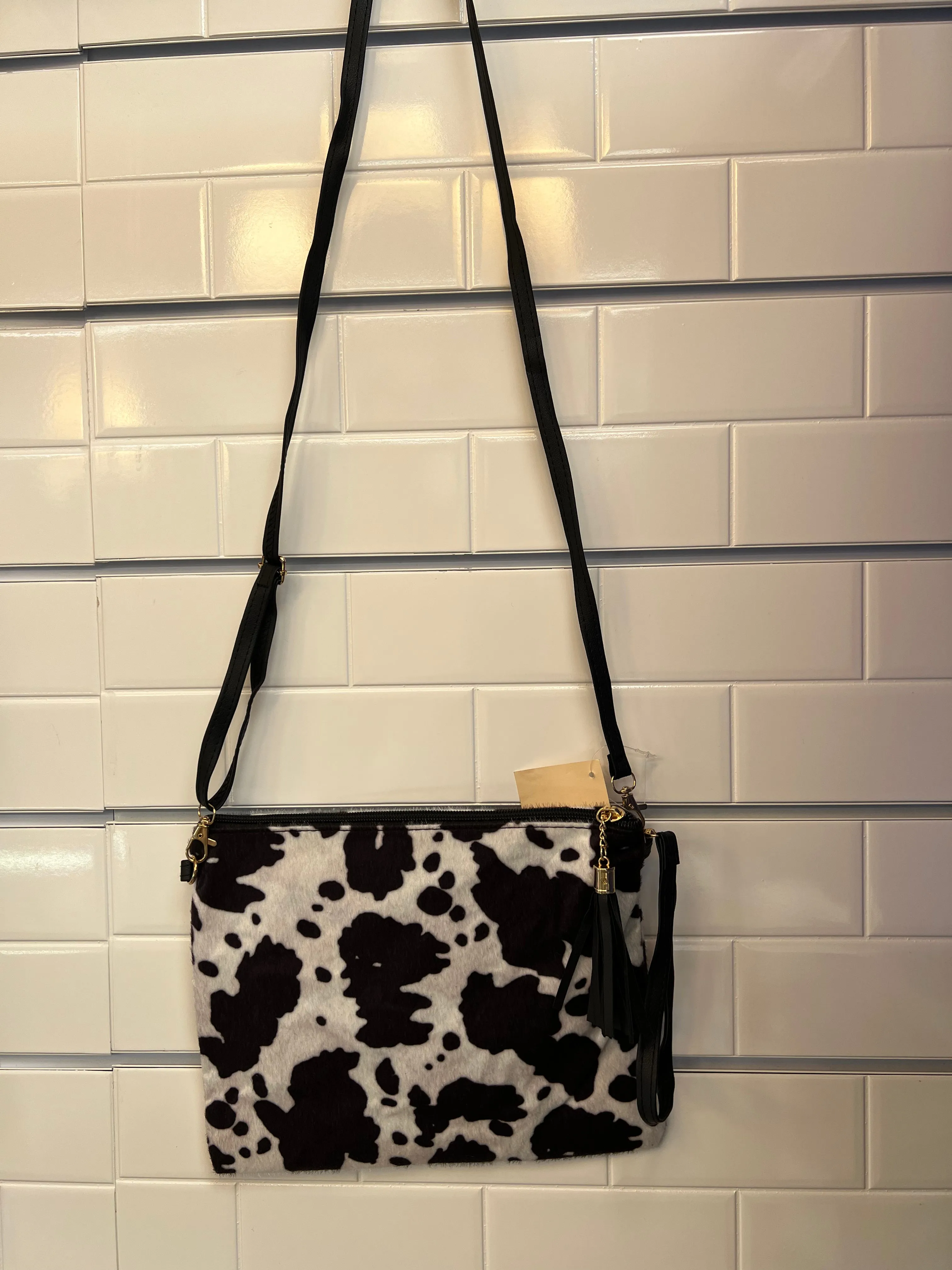 Crossbody handbags with wristlet straps